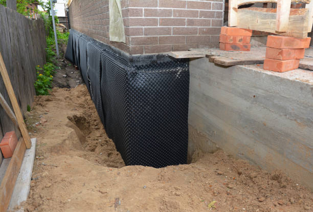 SJ Waterproofing Pros technician performing targeted Emergency Waterproofing assessment in Garnet Valley, PA